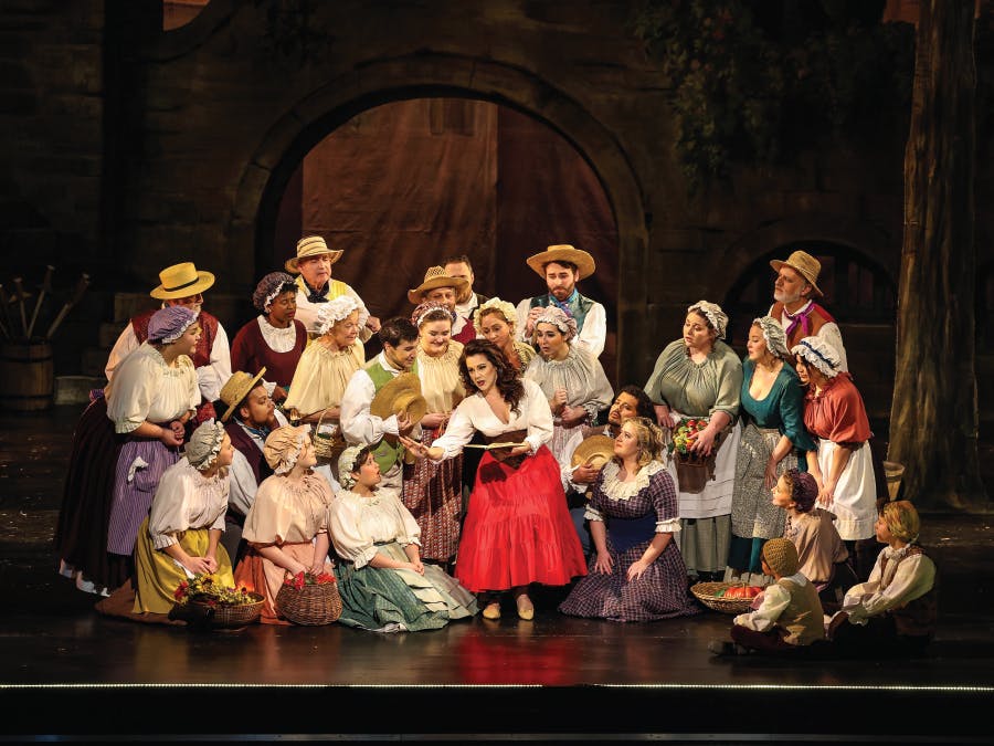 Avery Boettcher as Adina captivates the villagers in Vero Beach Opera’s 2023 L’Elisir d’Amore (photo by JPR Images)